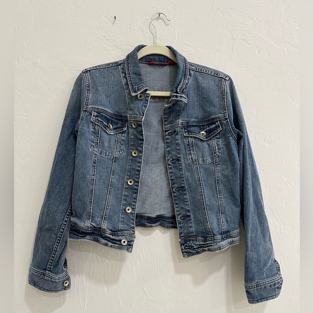 Denim jacket, blue. Button up.